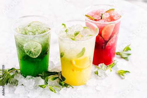 Fruit summer drinks with ice