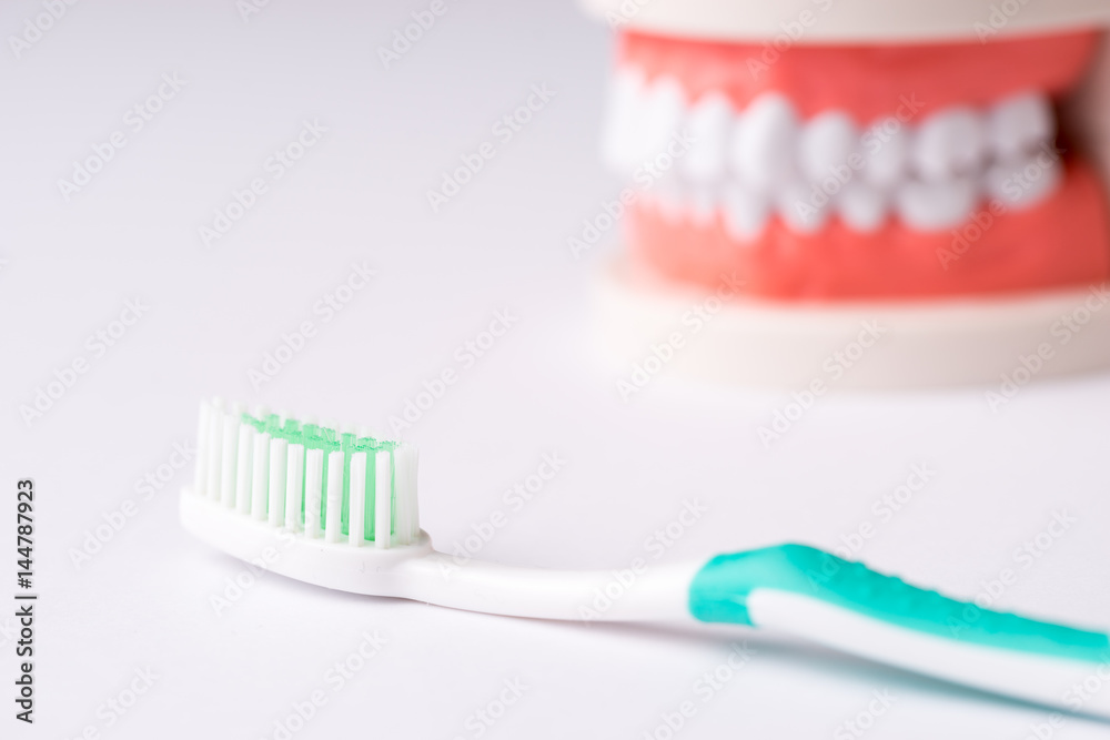 Set of Dentist's equipment tools, denture showing implant Set of Dentist's equipment tools, denture showing implant