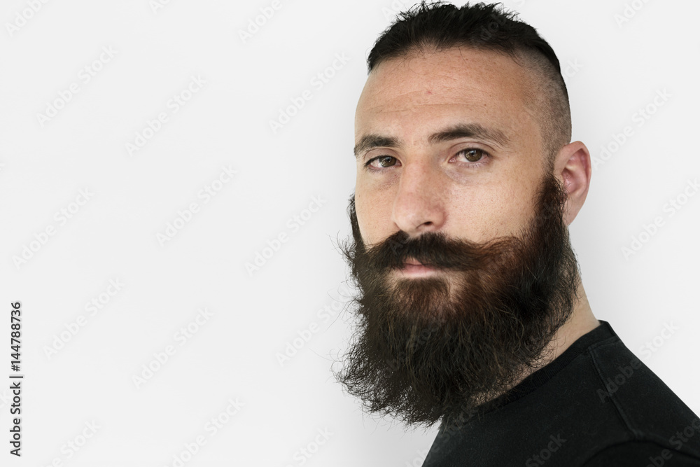 Fototapeta premium A man with beard and mustache in a studio shoot