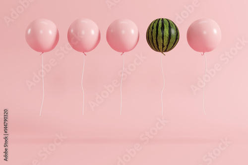 outstanding balloon watermelon concept on pastel pink background for copyspace. minimal concept.