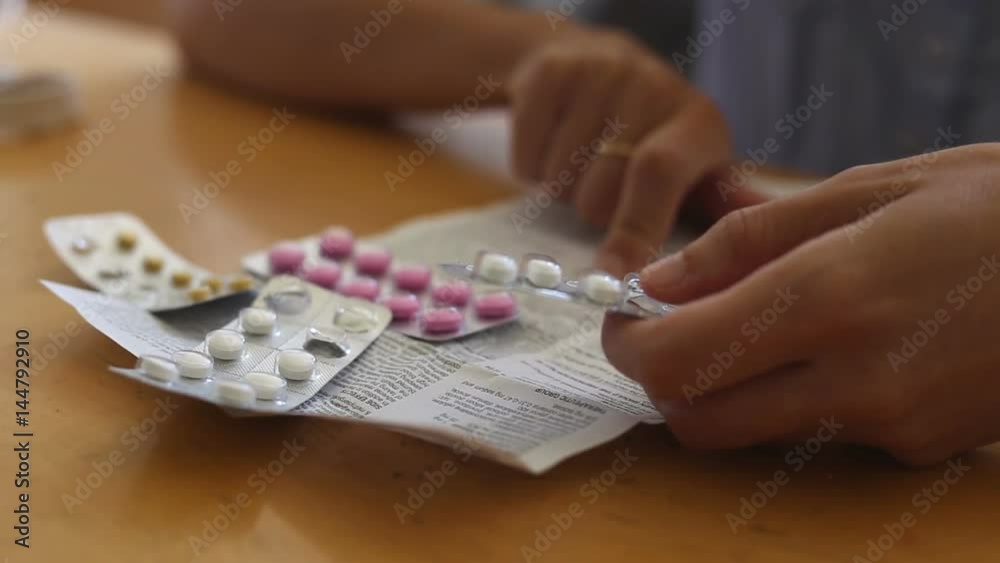 Woman reading the manual of drugs