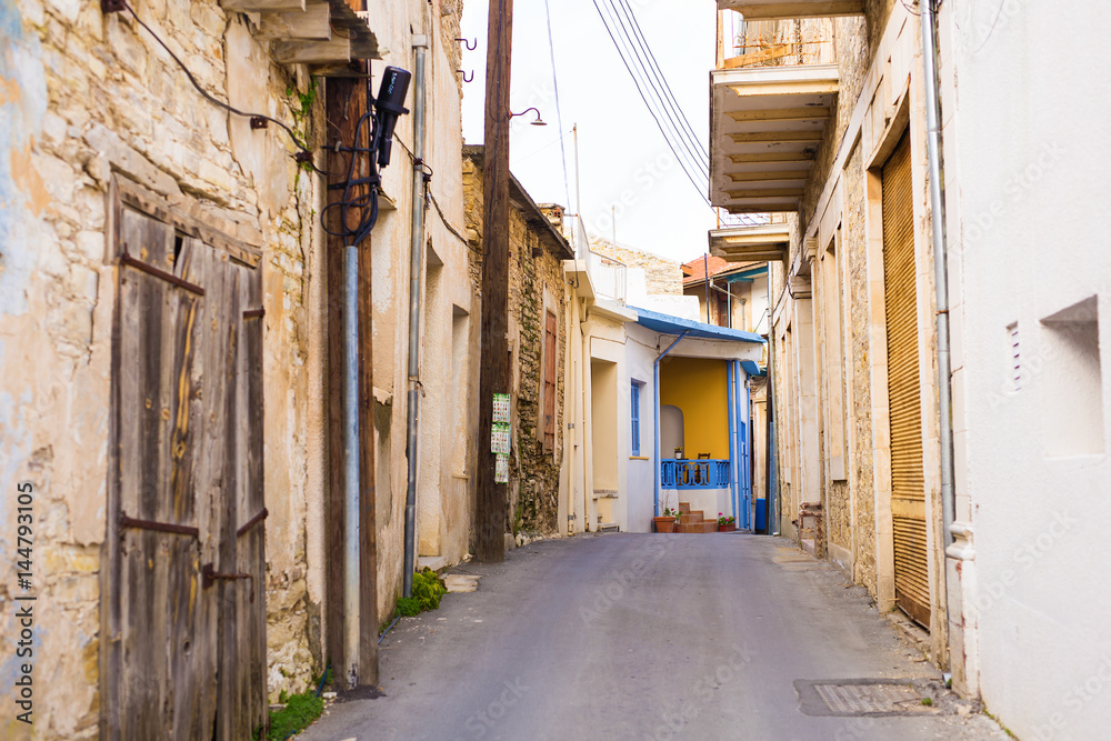 Naklejka premium Beautiful view of scenic narrow alley with historic traditional houses in an old town in Europe