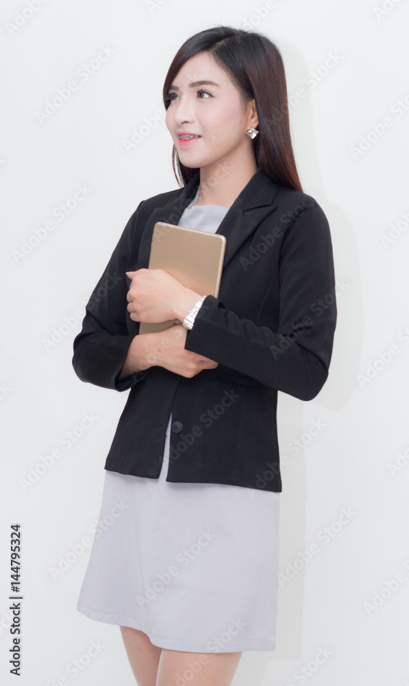 young businesswoman Hugged the tablet at the chest young businesswoman Hugged the tablet at the chest
