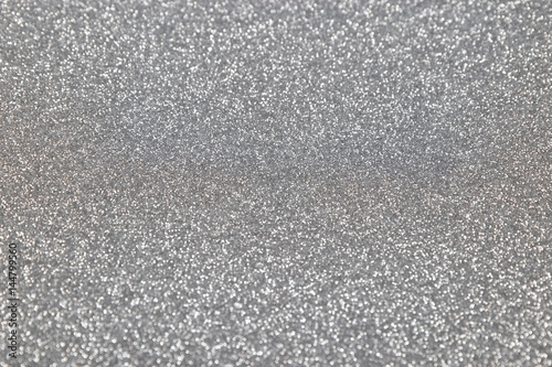 Silver glitter background. Abstract shiny texture.