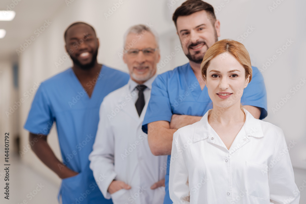 Young nurse expressing happiness in the hospital