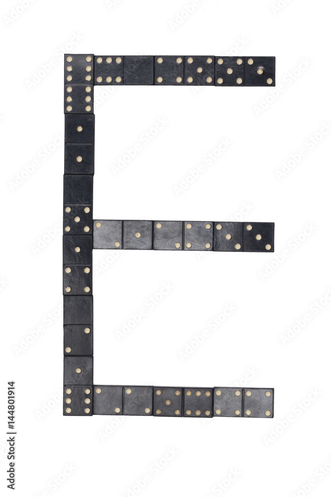 letter E made of  black  dominoes tiles