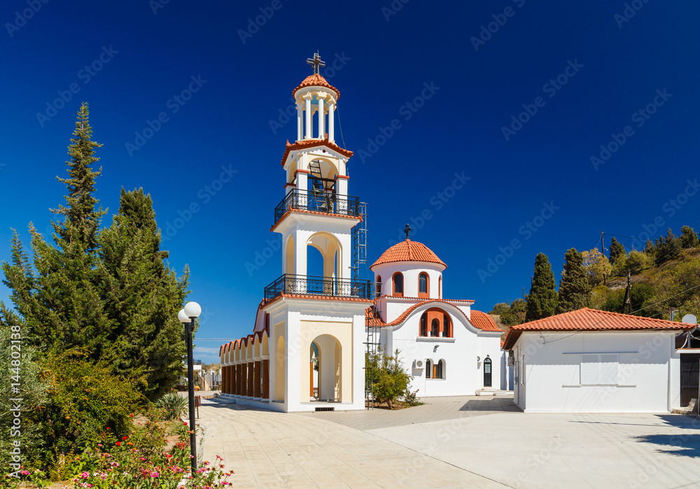 Bell tower and dome of the Orthodox Church on the island of Rhodes