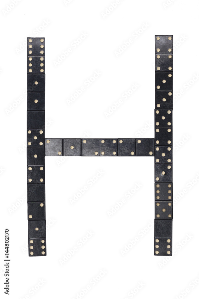 letter H made of  black  dominoes tiles