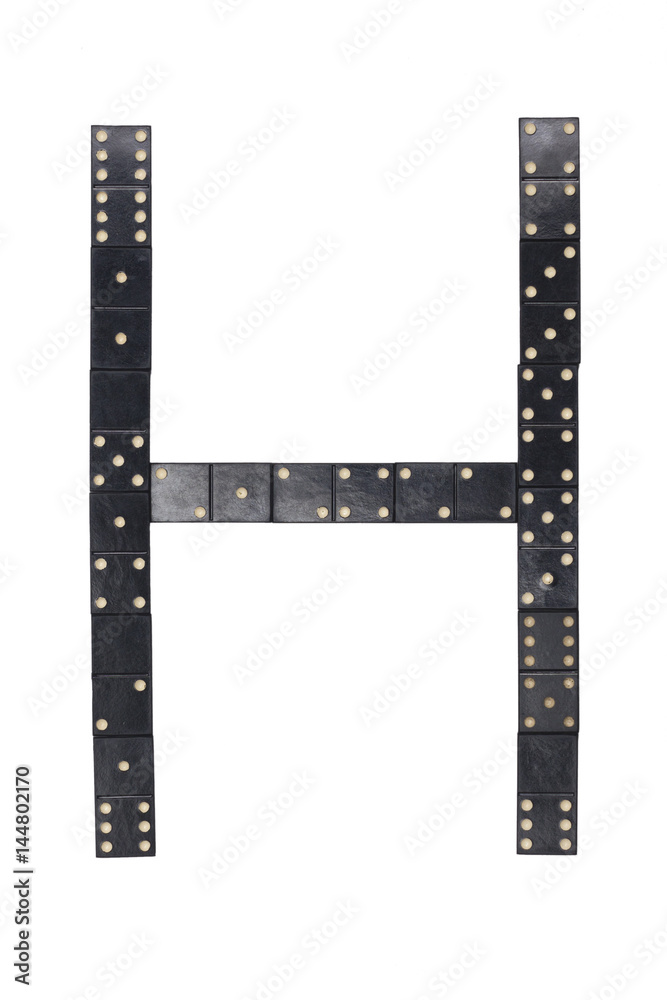 Obraz premium letter H made of black dominoes tiles