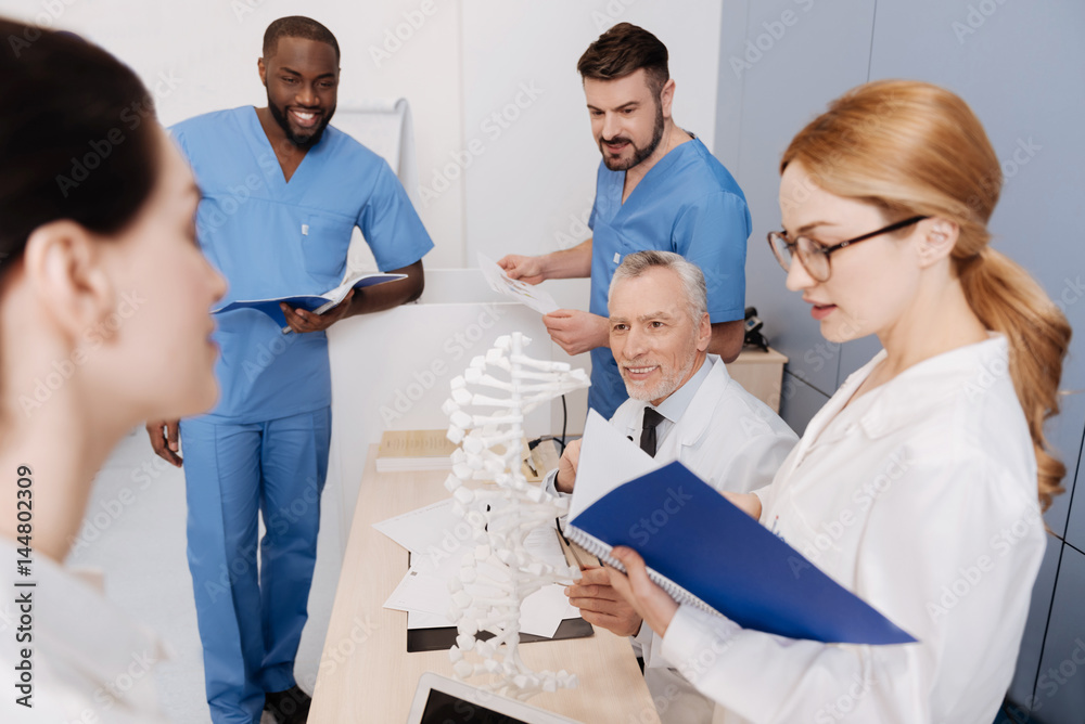 Obraz premium Smart students passing exam in the medical university