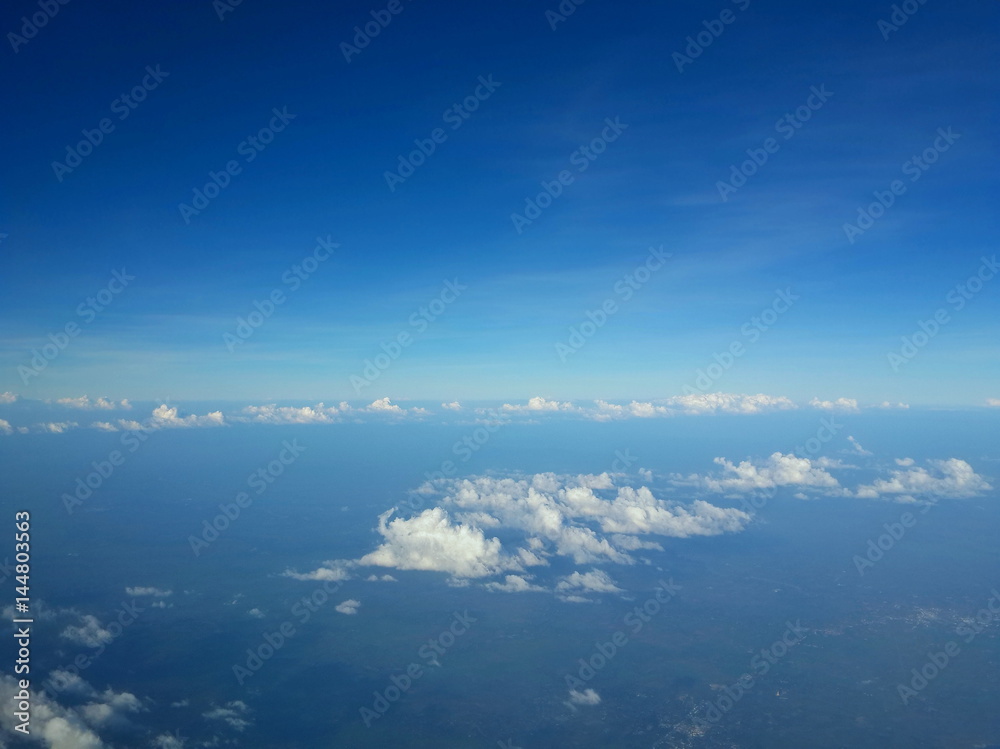 Blue sky and clouds. The view from the plane.