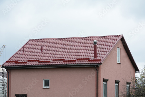 Wallpaper Mural Metal roofing construction. Rain gutter and snow guard. Chimney coaxial. House with individual heating. Torontodigital.ca