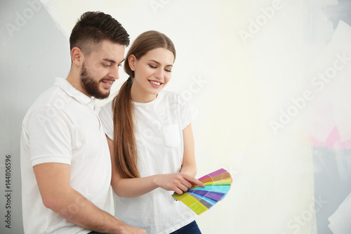 Couple choosing colors for ...