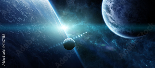 Fototapeta Naklejka Na Ścianę i Meble -  Sunrise over distant planet system in space 3D rendering elements of this image furnished by NASA