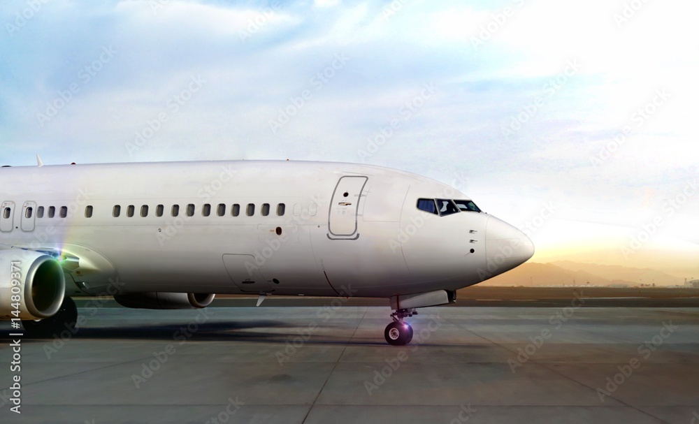 Airplane on runway during sunset Airplane on runway during sunset