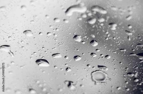 Closeup Of Rain Drops Through Window Glass
