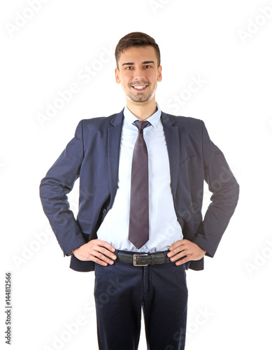 Handsome man in elegant suit on white background