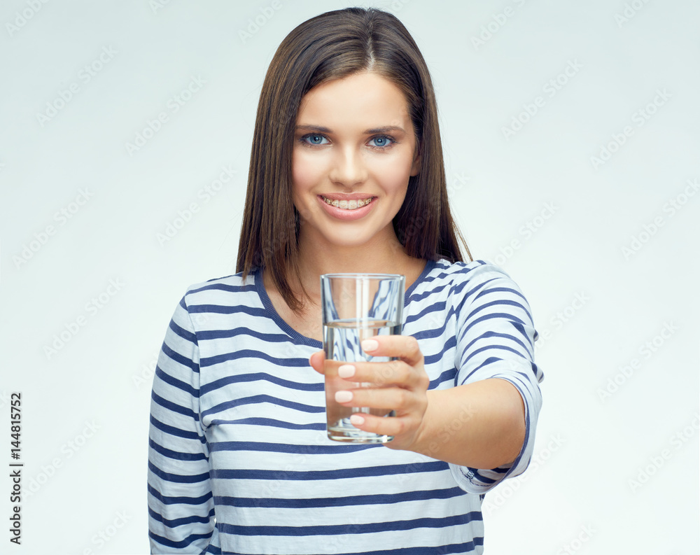 Beauty smiling young woman holding water glass. Beauty smiling young woman holding water glass.