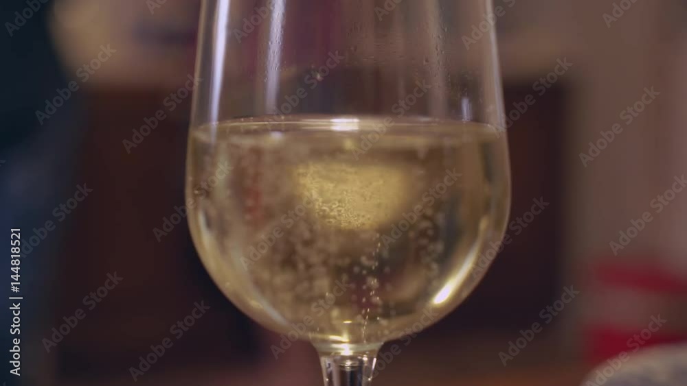 sparkling wine goblet. Wineglass with white bubbly. sparkling wine goblet. Wineglass with white bubbly.