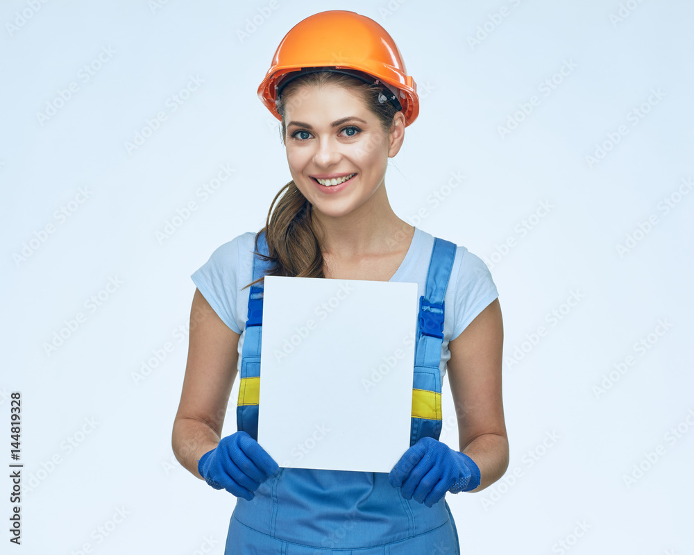 Builder holding white banner with copy space. Builder holding white banner with copy space.