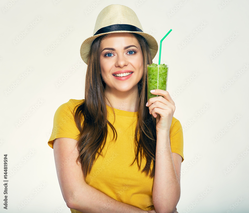 Portrait of young smiling woman holding smoothie glass. Portrait of young smiling woman holding smoothie glass.