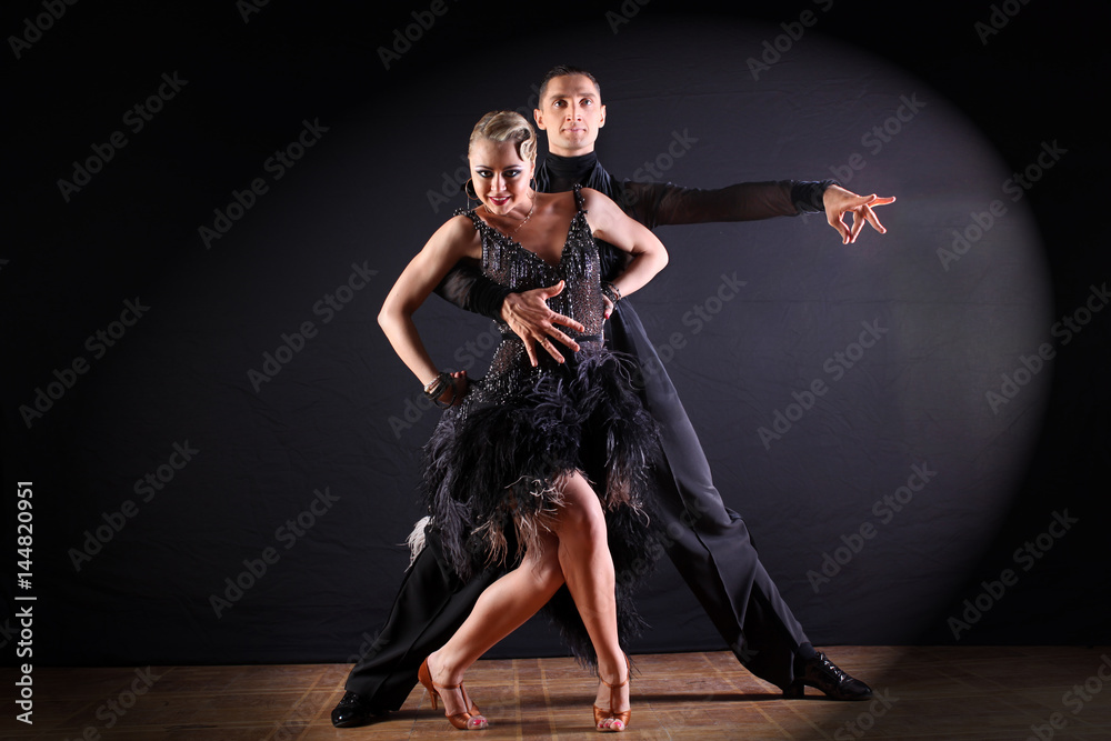 dancers in ballroom isolated on black background dancers in ballroom isolated on black background