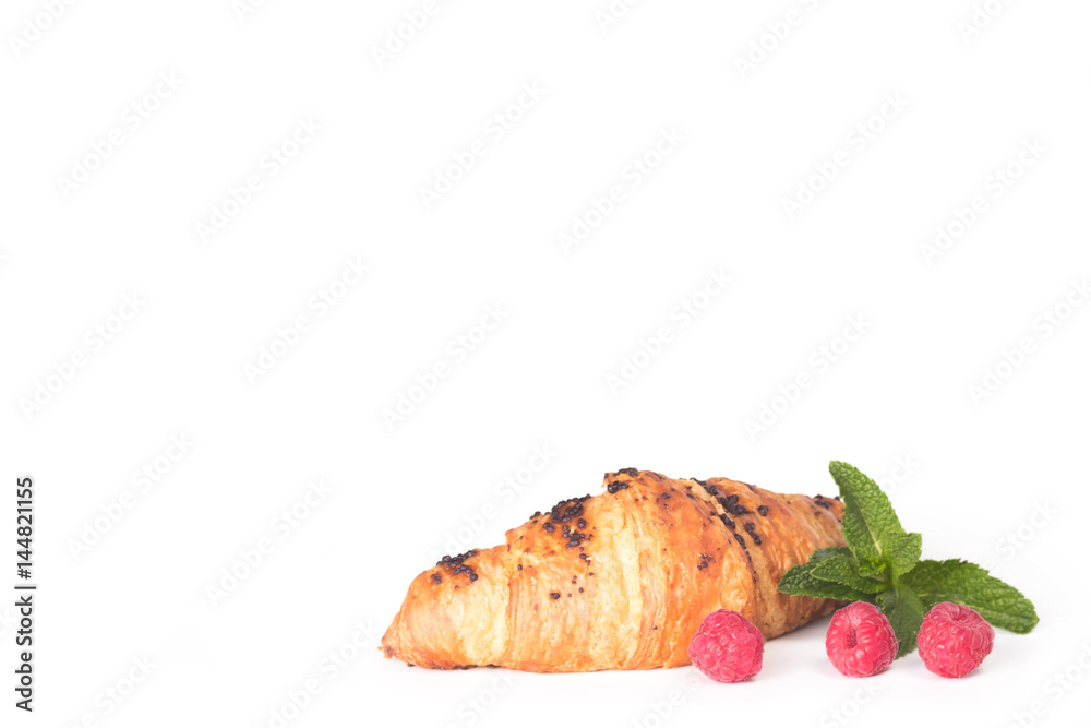 croissant with raspberry on plate isolated on white croissant with raspberry on plate isolated on white