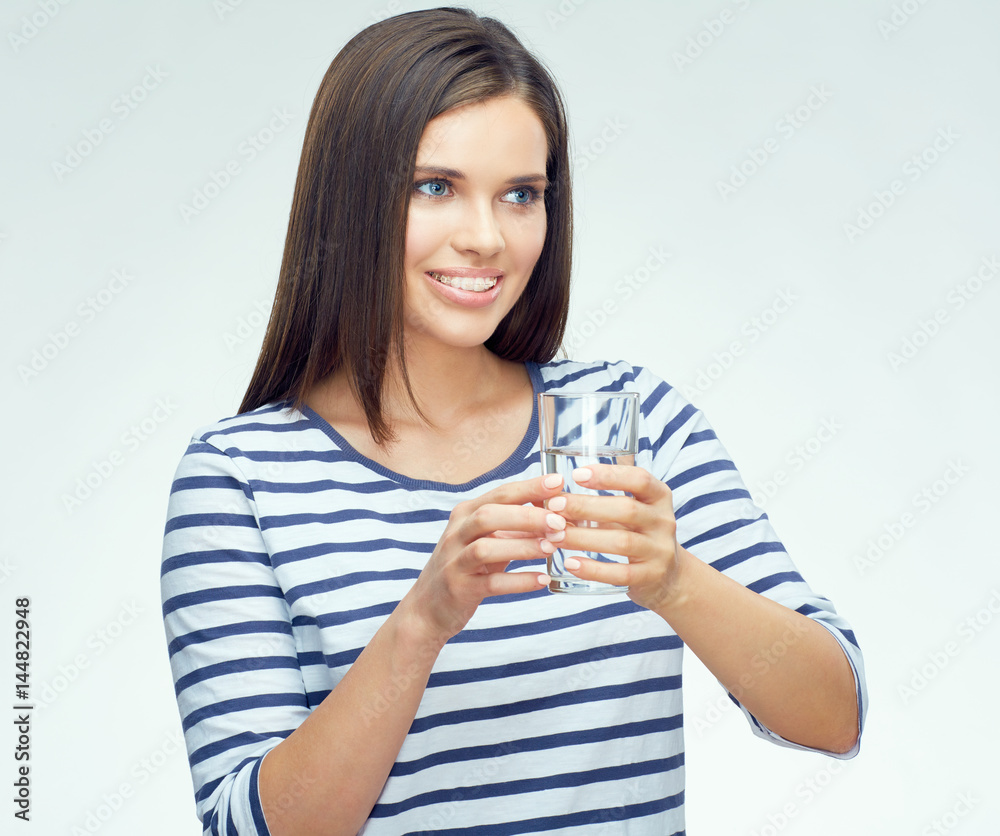 Beauty smiling young woman holding water glass. Beauty smiling young woman holding water glass.