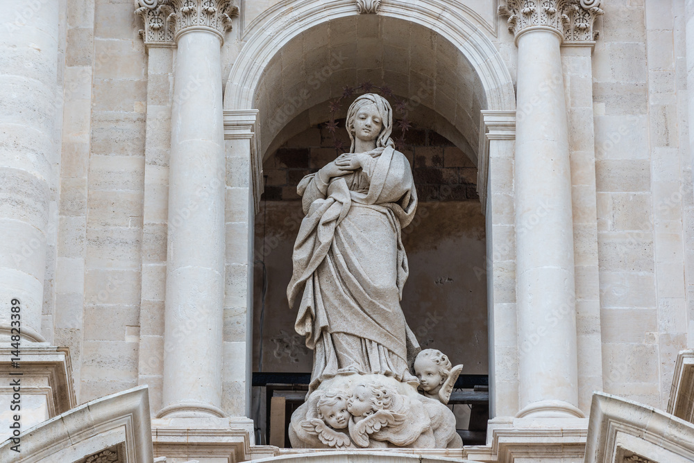 Our Lady sculpture on Syracuse Cathedral, Ortygia isle, Sicily Island in Italy
