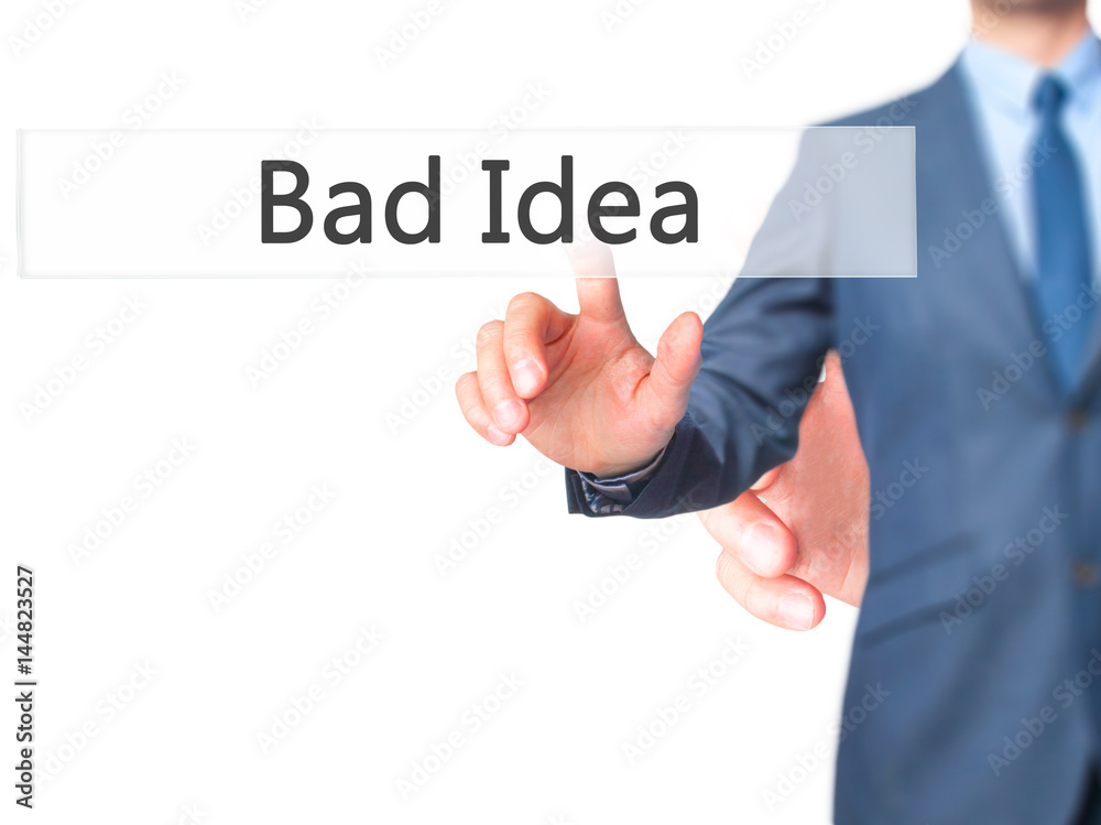Bad Idea - Businessman hand pressing button on touch screen interface. Bad Idea - Businessman hand pressing button on touch screen interface.
