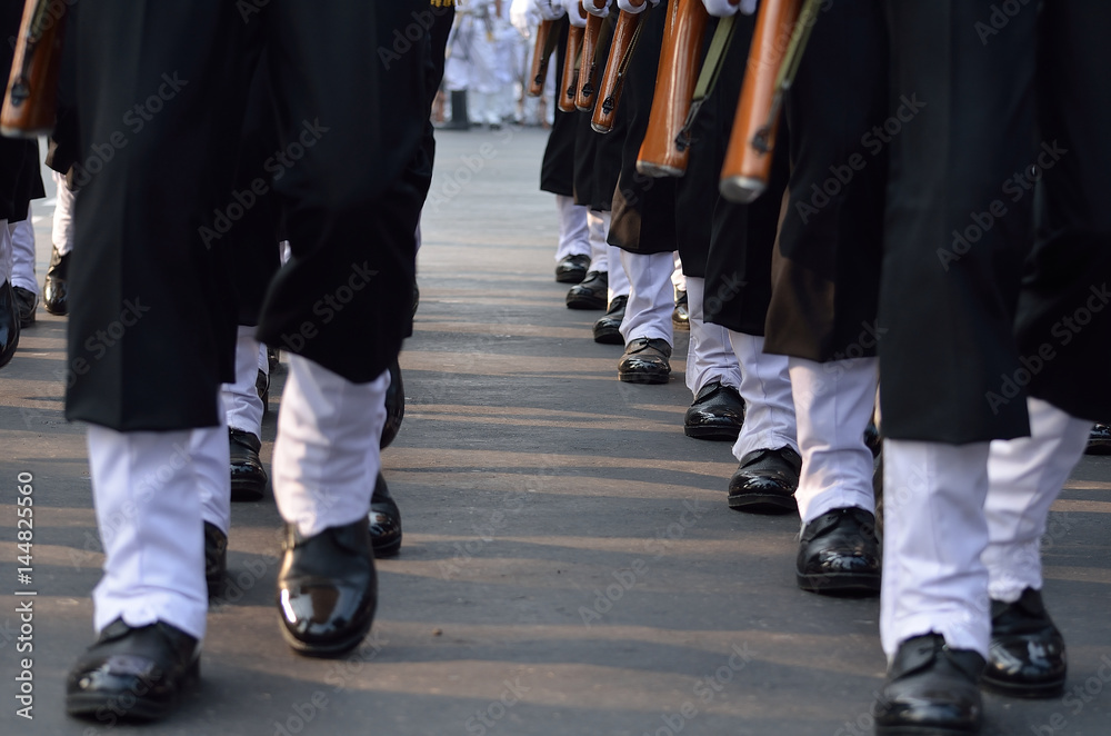 Fototapeta premium A group of military are walking with assault rifle.