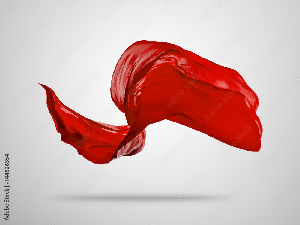 Fototapeta premium Smooth elegant red cloth on grey background