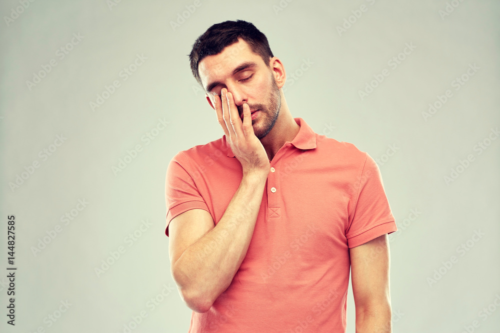 young man suffering from headache young man suffering from headache