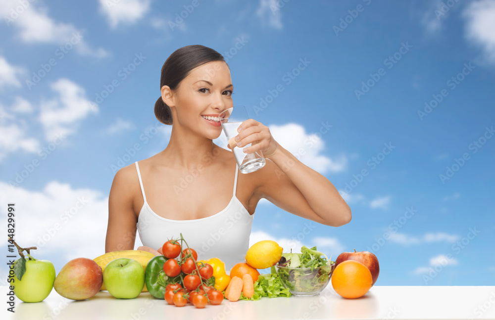 happy woman with glass of water and healthy food happy woman with glass of water and healthy food