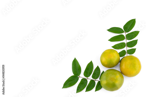 Mandarin oranges and green leaves isolated on white background