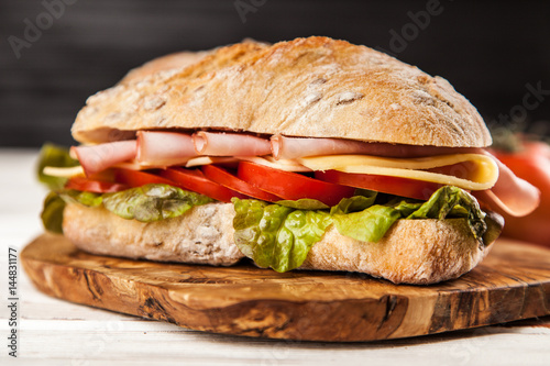 Delicious ciabatta sandwich © George Dolgikh