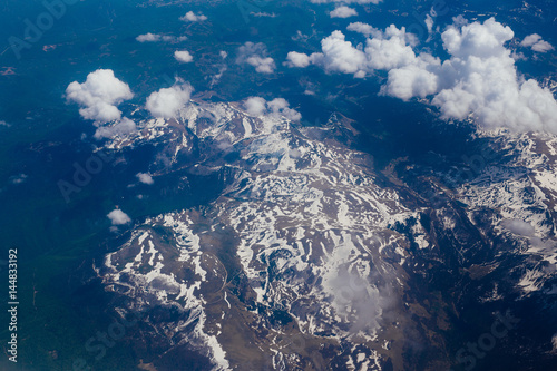 Snow-covered mountains of the plane in Montenegro