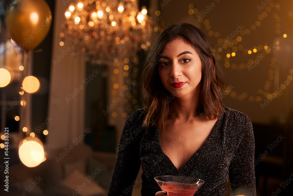 Portrait Of Woman Holding Drink At Cocktail Party Portrait Of Woman Holding Drink At Cocktail Party