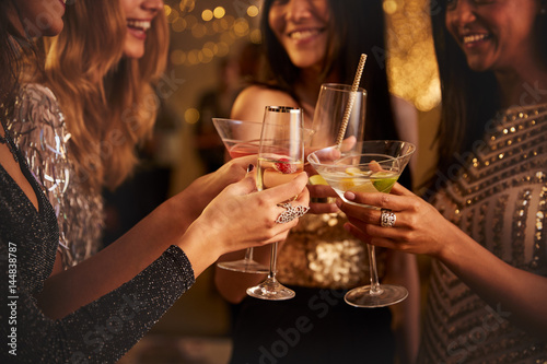 Photo Female Friends Make Toast As They Celebrate At Party