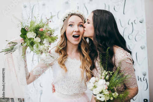 Beautiful bride with her pretty bridesmaids