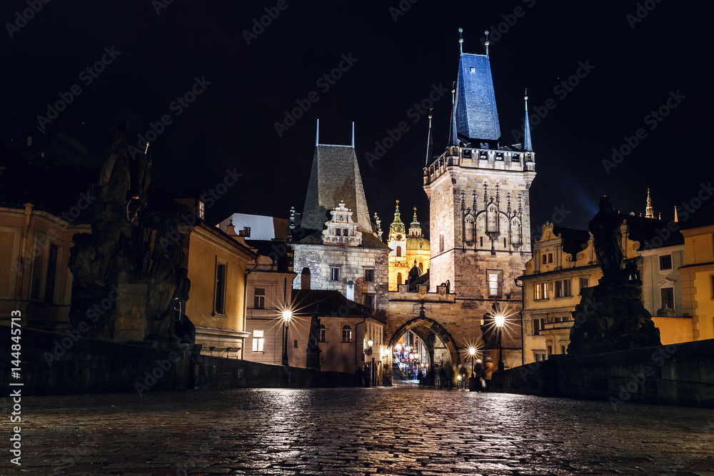 Night view from Charles Bridge in Prague to the Old town