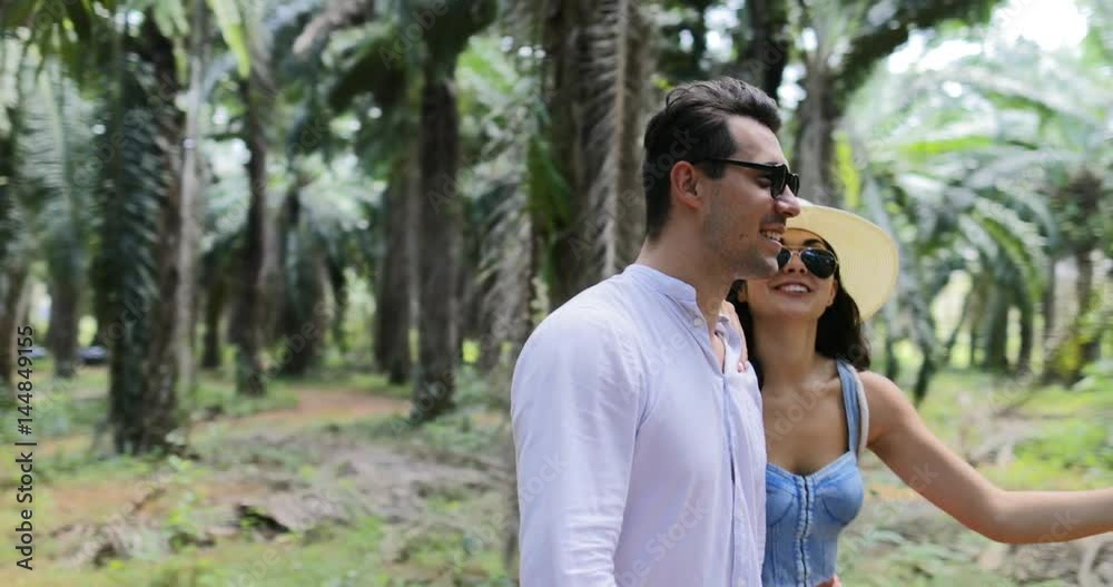 People Group With Backpacks Trekking On Forest Path, Young Men And Woman On Hike In Tropical Palm Tree Park Tourists Slow Motion 60 People Group With Backpacks Trekking On Forest Path, Young Men And Woman On Hike In Tropical Palm Tree Park Tourists Slow Motion 60