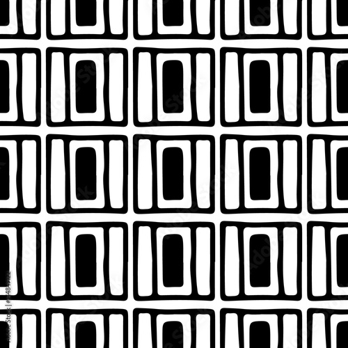 Seamless vector pattern. Black and white geometrical background with hand drawn decorative tribal elements. Print with ethnic, folk, traditional motifs. Graphic vector illustration.