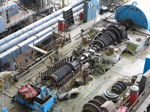 steam turbine in repair process, machinery, pipes, tubes, at power plant