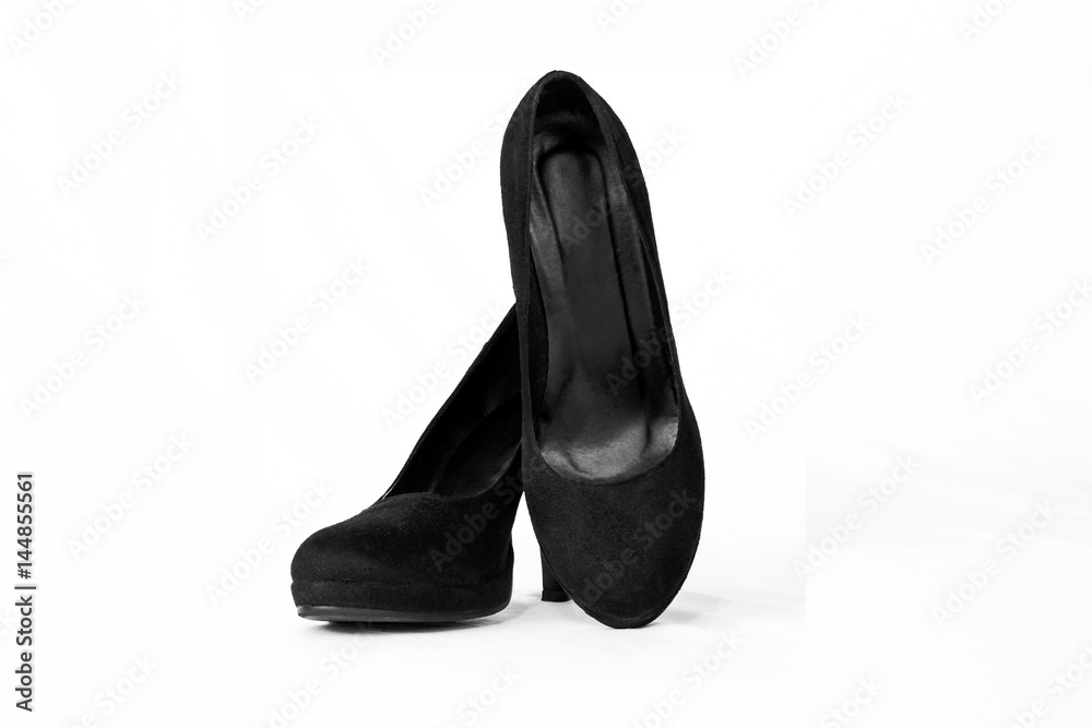 Beautiful Pair of black women's shoes with high heels isolated on white background Beautiful Pair of black women's shoes with high heels isolated on white background