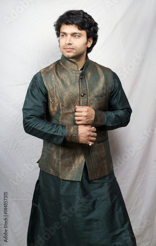 young indian male model in artistic green kurta