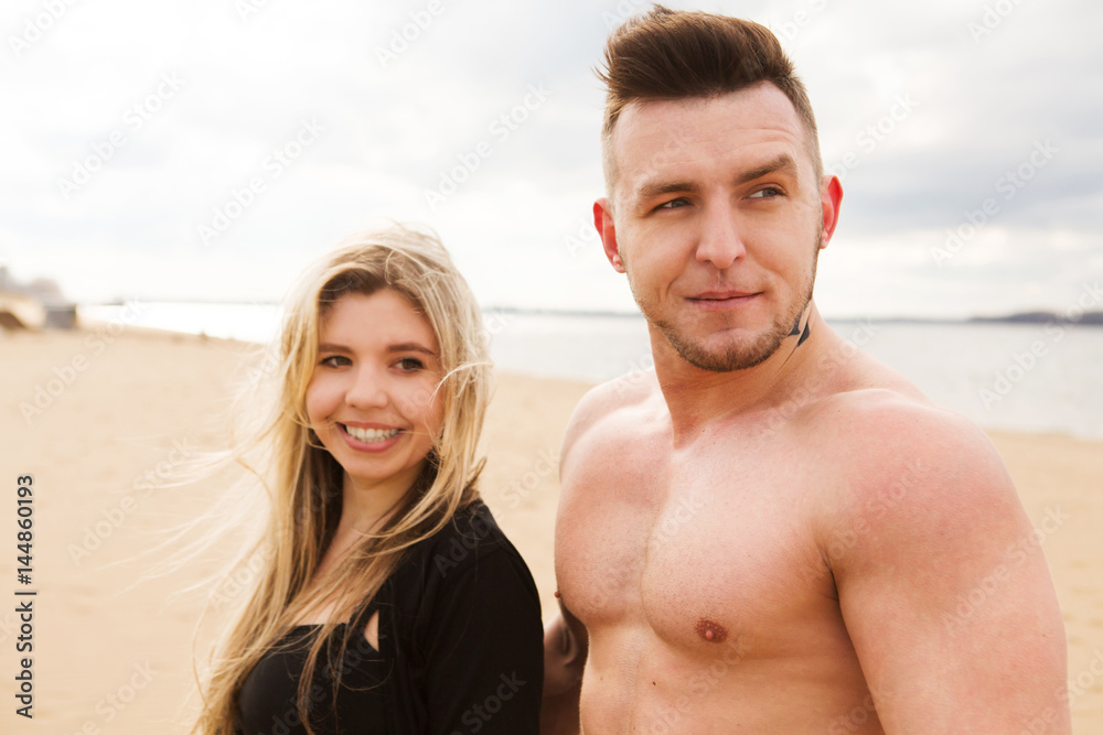 Fototapeta premium Fitness couple on a on the beach