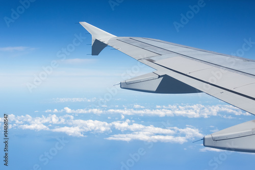  Above the clouds.Wing aircraft on the sky
