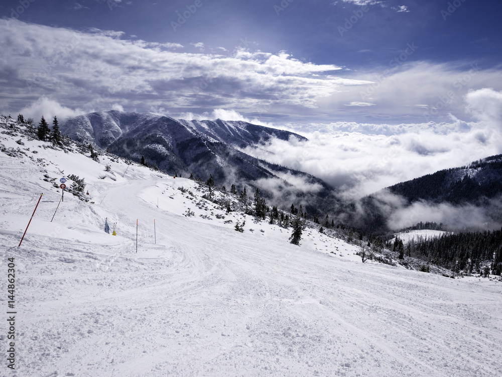 Landscape of Tatra lower mountain in winter time, with piste off Jasna Chopok ski resort.