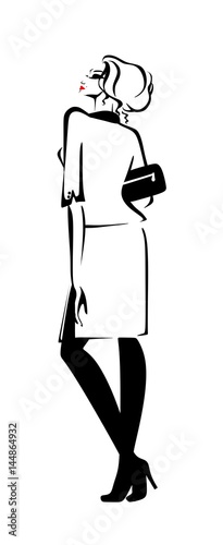 Businesswoman in a simple yet elegant suit in heels with a clutch in full growth on a white background isolated